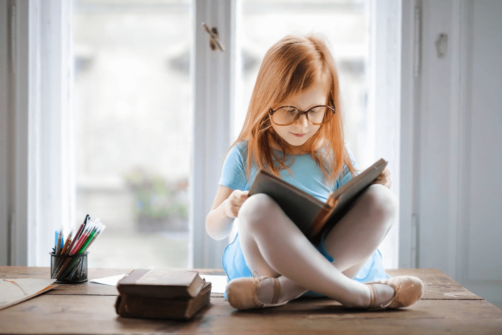 Young girl reading a book