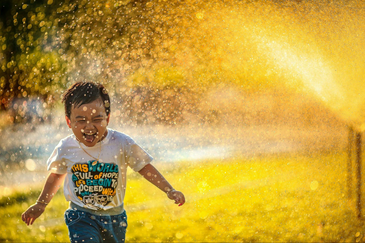 This is a boy playing outdoors