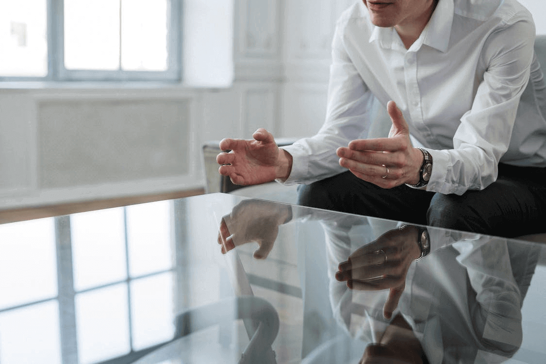 A divorce mediator at a table